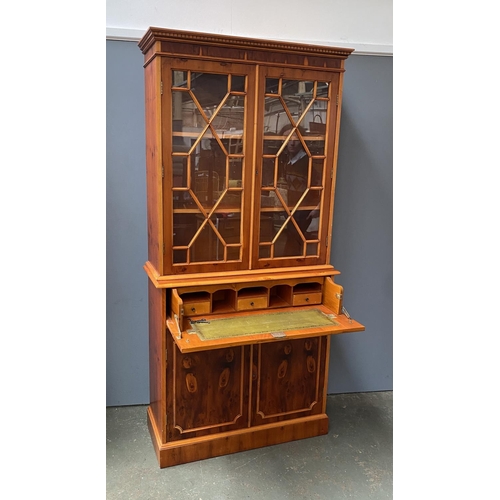 1158 - A 20th century yew veneer glazed secretaire bookcase, with cupboards below, 95x39x200cmH