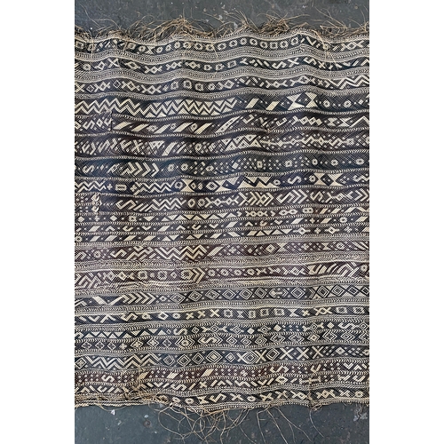 872 - A 19th/early 20th century woven straw tribal mat, 190x100cm