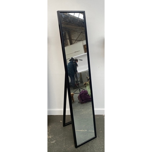 846 - A pair of long narrow mirrors with black frame, 30x150cm