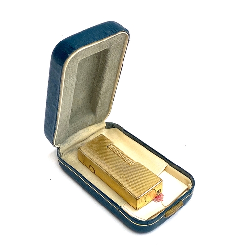 70 - A vintage Dunhill Rollagas gold plated lighter, US RE24163k 6.5cm high, in original box with papers