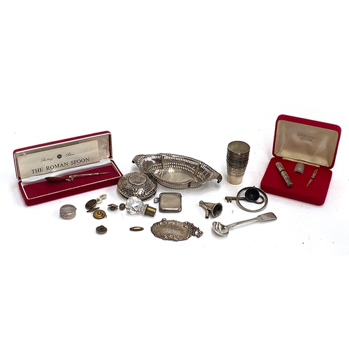 75 - A small lot of silver and white metal items to include a pierced bonbon dish by Johnson, Durban & Co... 