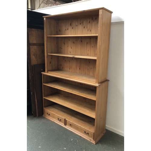 1173 - Two pine bookcases, 130x33x112cmH and 140x41x103cmH (2)