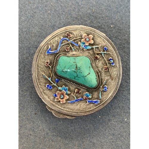 82 - An early 20th century Chinese export silver and enamel pill box set with a central turquoise stone, ... 