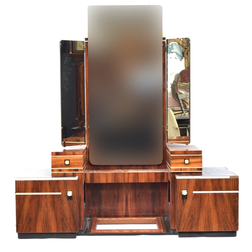 722A - A French Art Deco maccasar ebony dressing table, triple plate mirrors, three plain frieze drawers, f... 