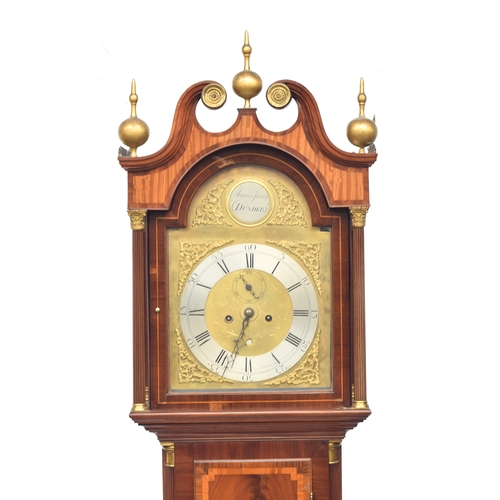 700 - A George III mahogany long cased clock with swan neck pediment and three balled finials, over a dome... 