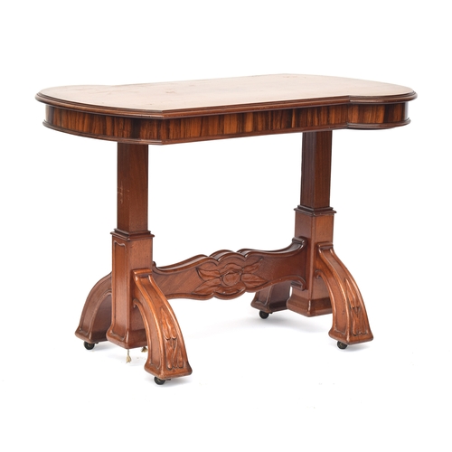 720 - A French Art Nouveau style mahogany and rosewood side table, the rectangular top with moulded edge a... 