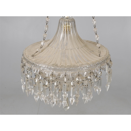 833 - A cut and moulded glass chandelier, 20th century, of trumpet form, with demi-globe suspended below, ... 