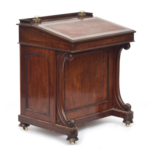 837 - A Victorian mahogany Davenport desk, with three quarter gallery and two inset cut glass inkwells, th... 