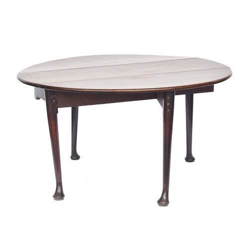 859 - A George II mahogany oval gateleg table, of good proportions, on tapering legs with pad feet, 138cm ... 