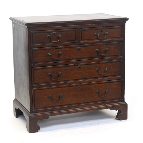 862 - An 18th century oak chest, the moulded top above two short and three graduating drawers, on bracket ... 