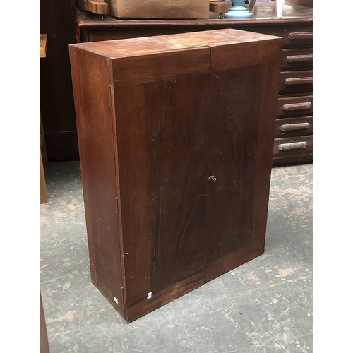 956 - A teak carpenters cabinet, fitted interior, hung with various tools, to include Marples chisels, 66x... 