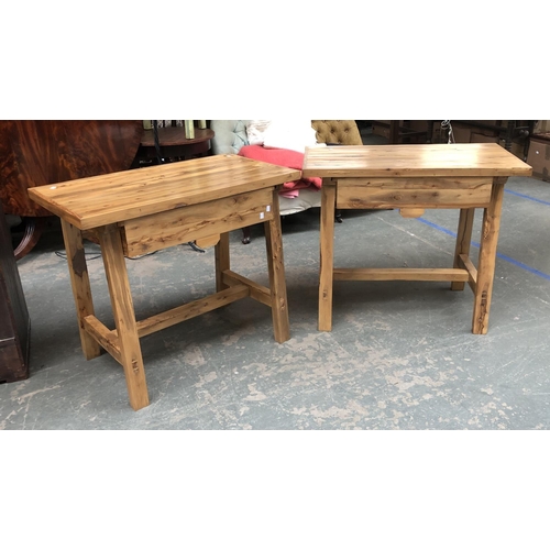 958 - A pair of olive wood side tables, each with single draw, on raised stretcher, each 91x50x76cmH