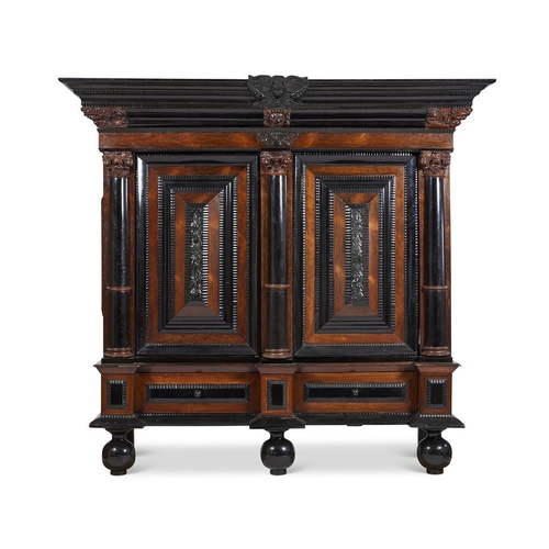 972 - A massive Dutch rosewood and ebonised schrank in 17th century style, 18th century and later, the doo... 