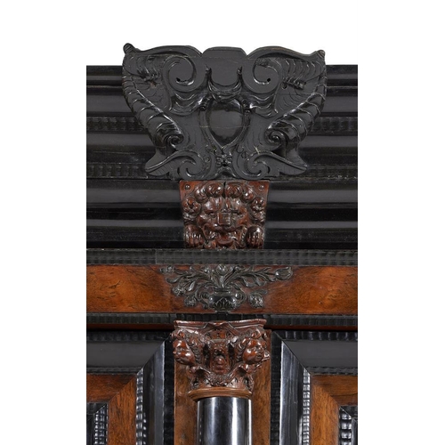 972 - A massive Dutch rosewood and ebonised schrank in 17th century style, 18th century and later, the doo... 