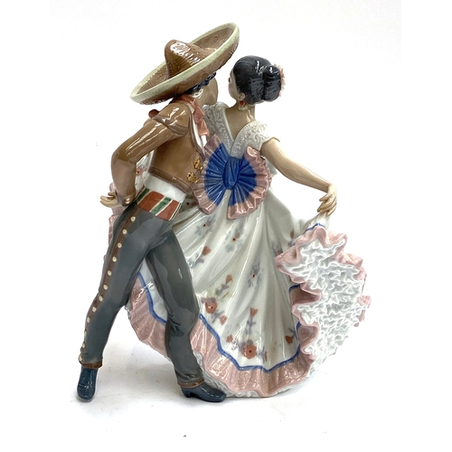 158 - A Lladro large figure group, Mexican Dancer, modelled as a couple dancing, sculpted by Regino Torrij... 