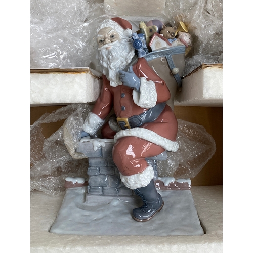 159 - A Lladro figurine 'Down The Chimney Santa' limited edition 378/1500, sculpted by Francisco Polope, d... 