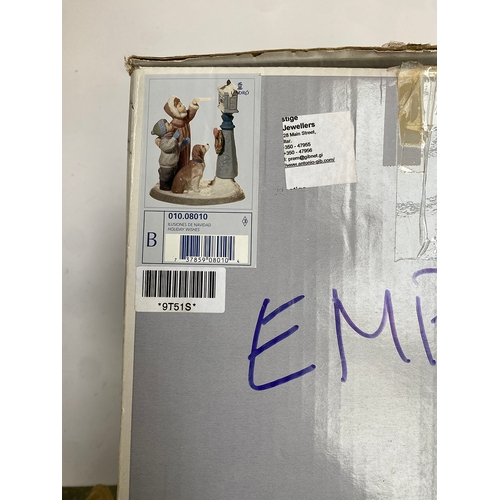 161 - A Lladro figure group, 'Holiday Wishes', no. 8010, 25cmH, in original box