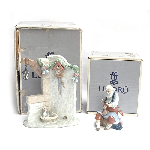 170 - A boxed Lladro 'It's Almost Time' (Santa's Workshop) figurine, model no. 6895, 28cmH; together with ... 