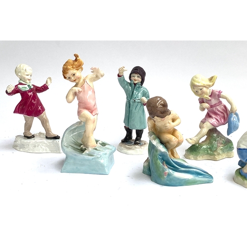 182 - A complete set of 12 Royal Worcester 'Months of the Year' children figurines, modelled by Freda Doug... 