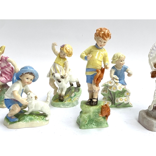 182 - A complete set of 12 Royal Worcester 'Months of the Year' children figurines, modelled by Freda Doug... 