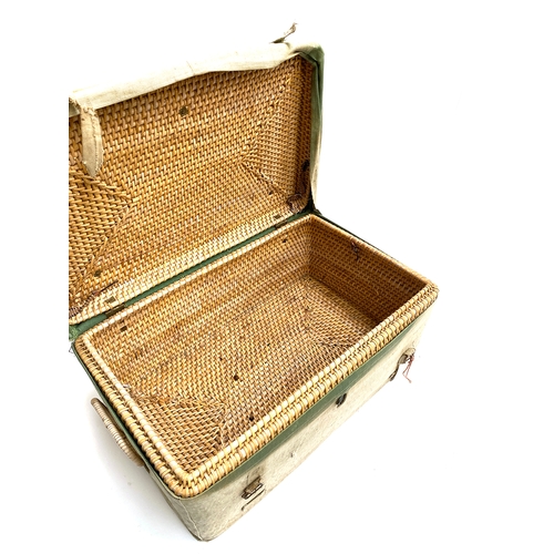 804 - A canvas covered wicker hamper, 55cmW