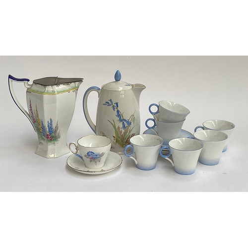 85 - Shelley teawares: A set of six Shelley coffee cups and saucers reg no. 781613; A Shelley coffee pot ... 