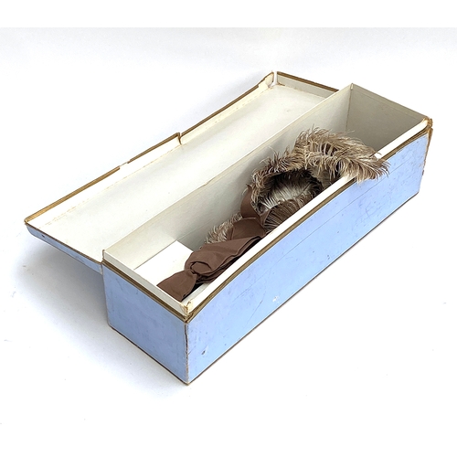 273 - A large ostrich feather and faux tortoiseshell fan, in original box (af)