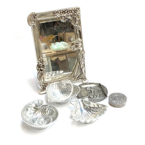 86 - A plated Art Nouveau style mirror, 40cmH; together with three seashell dishes; and two pewter items