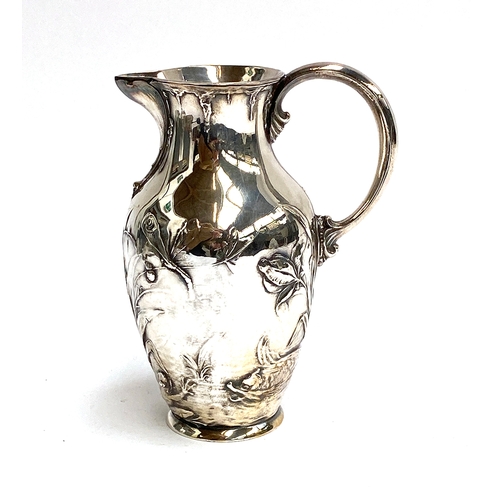 89 - An Art Nouveau/Jugendstil WMF (Württembergische Metallwarenfabrik) silver jug, decorated with a rive... 