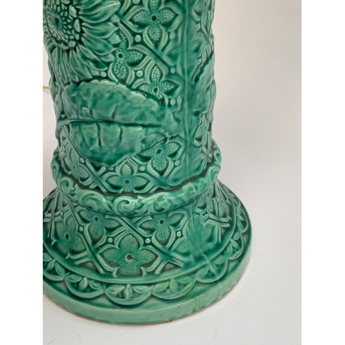 269 - Interior design interest: a large green glazed ceramic column table lamp with sunflower and quatrefo... 