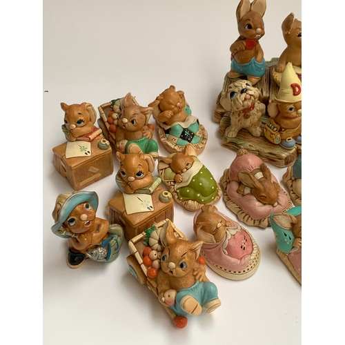 126 - A quantity of Pendelfin figurines (approx. 40), together with 3 stands