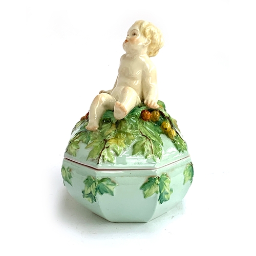 186 - A rare early 20th century Royal Worcester porcelain box, modelled by Henri Bargas, the lid surmounte... 