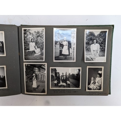 418 - A large quantity of 20th century holiday photographs and postcards, from the 1920s to early 60s; to ... 