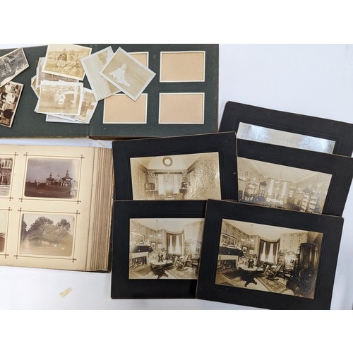 419 - A quantity of late 19th/early 20th century photographs, to include coastal holiday scenes and family... 