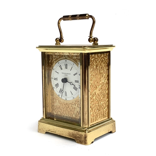 99 - A gilt metal carriage clock, the dial signed Taylor & Bligh, 11cmH