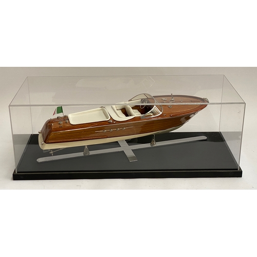 287 - Model boat interest: A scale model of a Venetian motor launch, probably Riva, 64cm long, within a pe... 