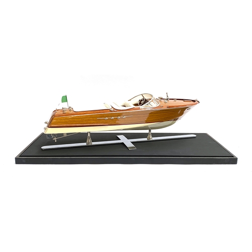 287 - Model boat interest: A scale model of a Venetian motor launch, probably Riva, 64cm long, within a pe... 