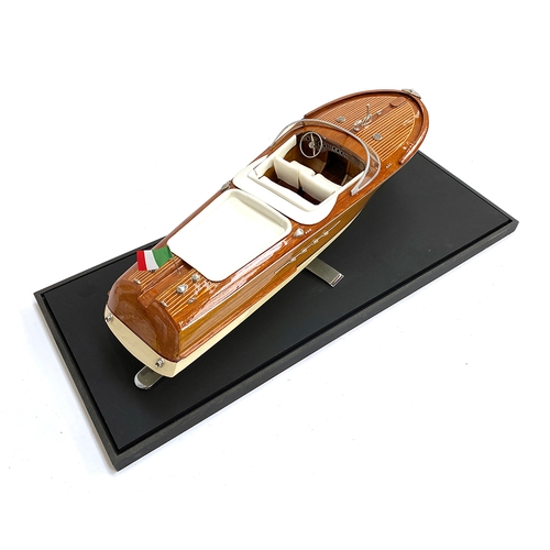 287 - Model boat interest: A scale model of a Venetian motor launch, probably Riva, 64cm long, within a pe... 