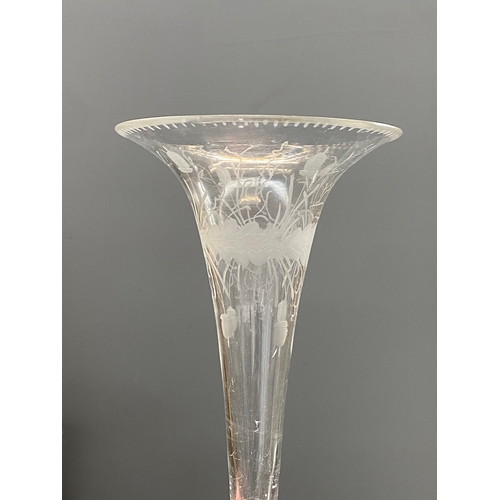 214 - An engraved glass epergne, 25cmH