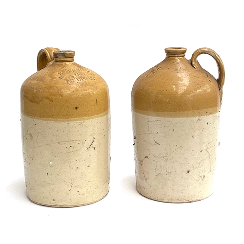 292 - Local interest: A pair of stoneware flagons, stamped W.H. Chick, Wine Merchant Bridport, 37cmH