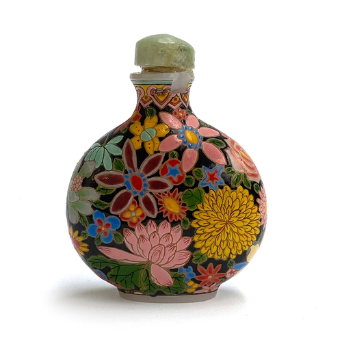 227 - A late 19th/early 20th century Chinese glass snuff bottle, with polychrome enamel profuse floral dec... 