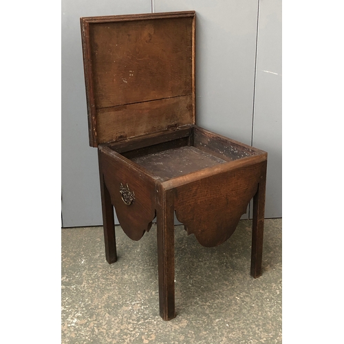 727 - A George III oak commode stool, having twin handles carry, 49x56x51cmH