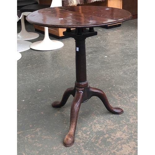 731 - A George II mahogany tip-top tripod table with birdcage action, 65cmD 70cmH