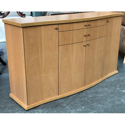 823 - A Danish mid century style Skovby sideboard, serpentine front, of two long drawers over two cupboard... 