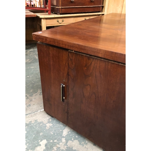 901 - A 20th century Iroko pedestal desk, each pedestal with cupboard door opening to four slides, the out... 