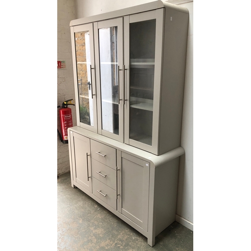 963 - A modern grey painted dresser, three drawers flanked by cupboards, with glazed top, 130cmW