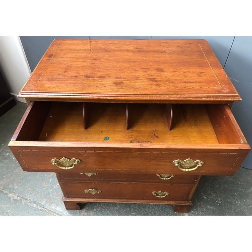 713 - An early 20th century oak chest of four graduating drawers on bracket feet, 79x49x91cmH