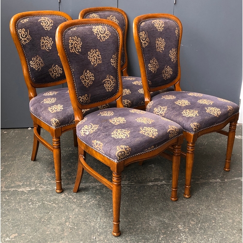 739 - A set of four 20th century dining chairs with upholstered seats and back