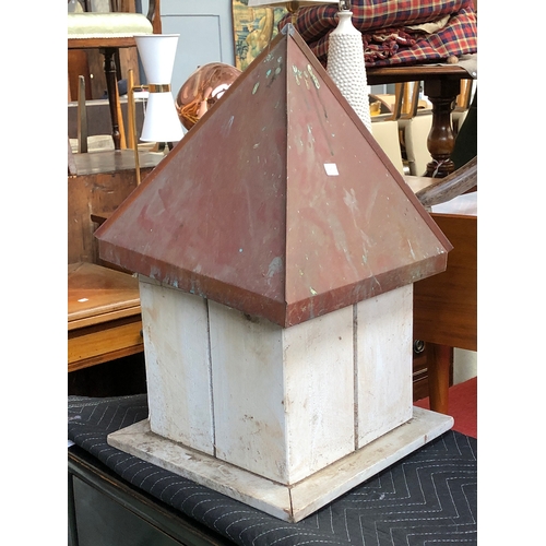 828 - A beehive with copper pyramid roof, 61cmH