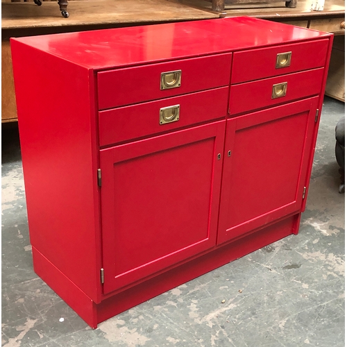 920 - Interior design interest: a red lacquered sideboard, four drawers over two locking doors, with key, ... 